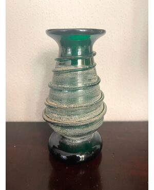Iridescent green glass jar with archaeological-style spiral applications.Fratelli Toso.Murano     