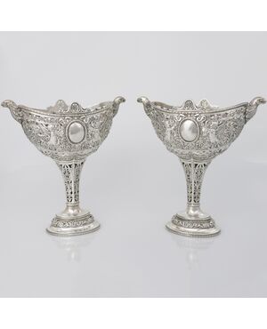 Pair of pierced, embossed and chased silver cups, Hanau, late 19th century