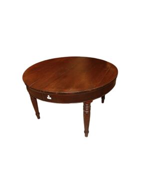 Large round extendable walnut table from the early 1800s
