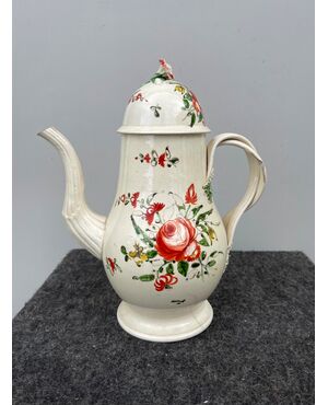 Rose decorated earthenware coffee pot Derbyshire, England.     