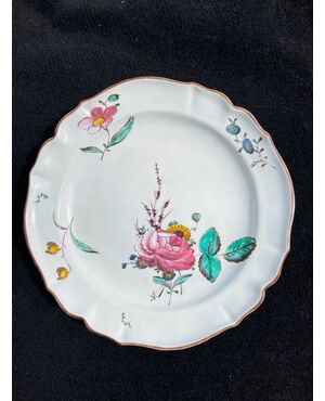 Majolica plate with rose decoration Finck manufacture, Bologna.     