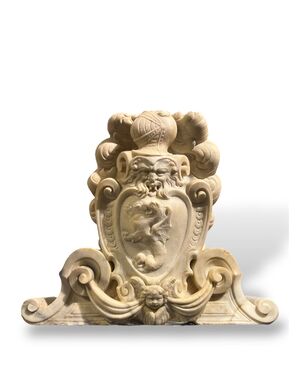 Large heraldic coat of arms carved in marble