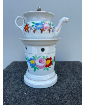 Veilleuse tea pot in porcelain decorated with floral motifs.France     