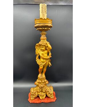 Carved and gilded wooden candlestick with cherub figure - 18th century.