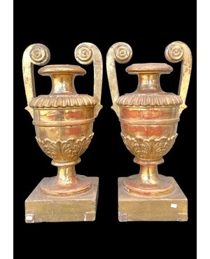Pair of carved and gilded wooden palm holders. Genoa.
