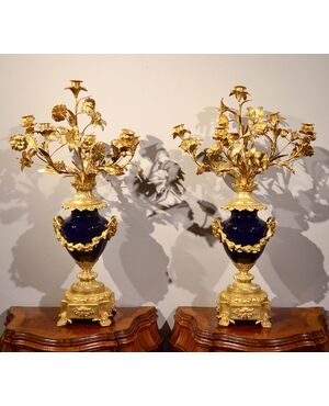 Pair of Louis XVI gilded bronze and blue Sevres porcelain candelabras, France 19th century