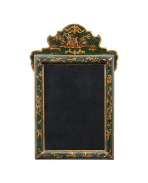 Lacquered, gilded, and painted wooden mirror. Venice, 18th-19th century.