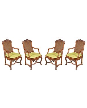 Four carved wooden armchairs. Lombardy, mid-18th century.