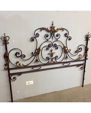 Elegant antique wrought iron double bed headboard. Gold and purple, circa 1930. Dimensions: cm180 . h 155