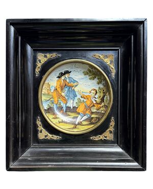 Majolica plate decorated with figures. Made in Castelli d’Abruzzo.