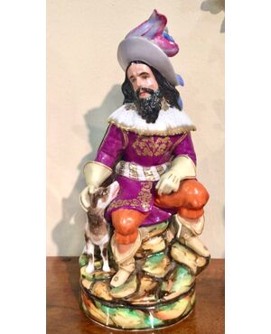Veilleuse tisaniera in porcellana raffigurante figura maschile in costume con cane.Modello Jacop Petit,Francia.