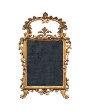 Carved and gilded wooden mirror. Italy, 18th century.