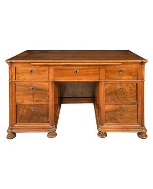 Walnut veneered trestle desk. Italy, first half of the 19th century.