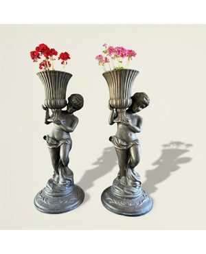 
Coppia Fioriere in Ghisa con Putti