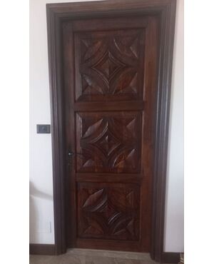 Door with carved panels