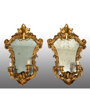 Pair of Louis XV style mirrors/sconces in gilded and carved wood. Venice, 19th century.