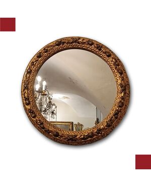 Round gilded wood mirror, second half of the 19th century