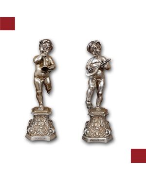 PAIR OF SILVER CHERUBS SECOND HALF 19TH CENTURY