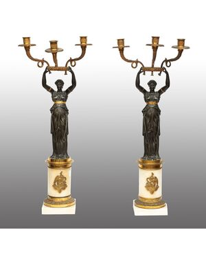 Pair of Charles X candlesticks/Flambeaux in patinated bronze and white statuary marble. France, early 19th century.