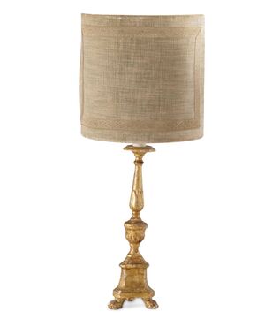 Empire style carved and gilded wooden candlestick. 19th century