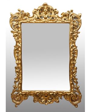 Specchiera antica stile Luigi XV in legno dorato e intagliato. Firenze XIX secolo.