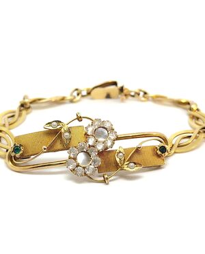 Bracciale in oro con smeraldi e diamanti