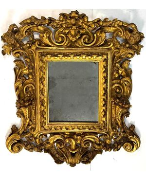 Specchiera in legno scolpito, intagliato e dorato, Toscana, inizi del XVIII secolo