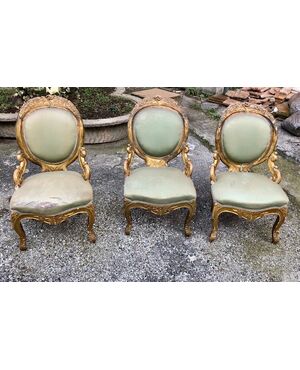 Three mid-19th century gilded armchairs