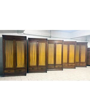 Set of five light walnut bookcases