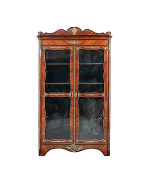 Showcase veneered in various woods. France, late 19th century.