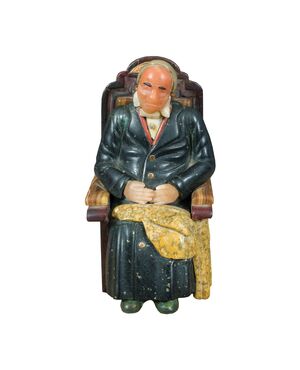 Small sculpture in various marbles and hard stones - Seated old man. Probably Russia, 19th-20th century.
