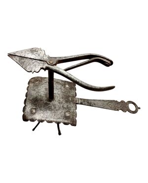 17th century wrought and engraved iron lamp