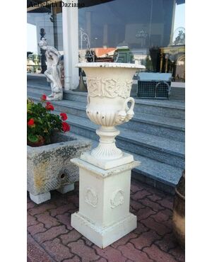 Pair of cast iron vases with pedestal
