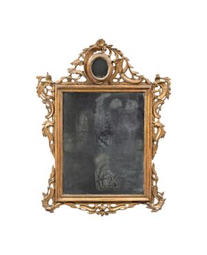 Carved and gilded wood mirror. Venice, 18th century.