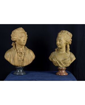 Pair of 19th-century French terracotta busts resting on circular marble bases, signed on the back.
