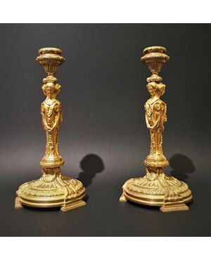 Pair of gilded bronze candlesticks, France early 19th century