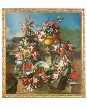 Francesco Lavagna (Naples 1684-1724), Sumptuous still life with a composition of flowers, watermelon, crockery and a garden in the background