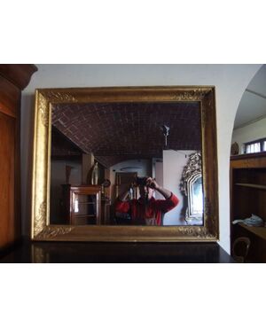 Rectangular gilded mirror, Empire style, 19th century, cm L 92xH77