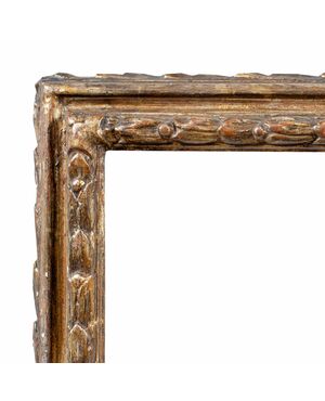 Cornice barocca in legno intagliato e dorato. Lombardia, XVII secolo.