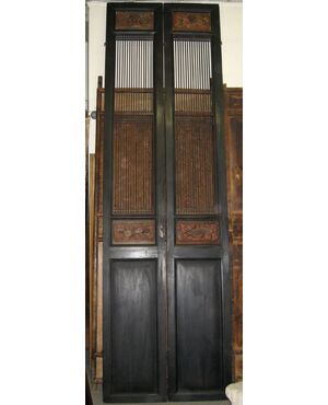 04 Lacquered and carved Chinese door panels.