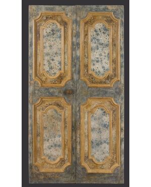 Marche region double-leaf door painted in faux marble.