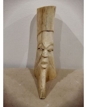 Antique African bone sculpture depicting a face - 19th century