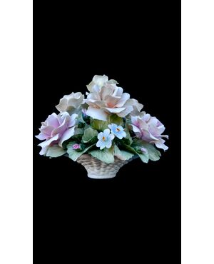 Floral arrangement with Bisquit porcelain basket. Capodimonte.