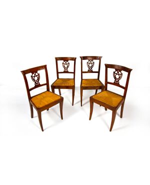 Four walnut chairs, Veneto, first half of the 19th century