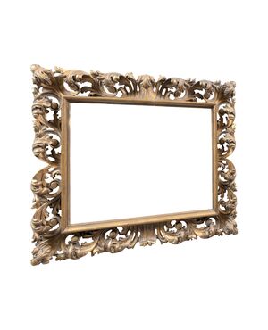 Carved and gilded wooden frame. Italy, 19th century.