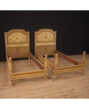 Pair of Louis XVI style beds in lacquered wood from the 20th century