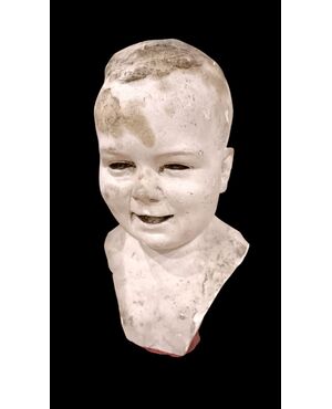 Testa di bambino in gesso