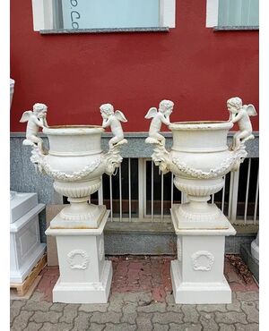 Pair of cast iron vases with Art Nouveau pedestal