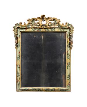 Carved and lacquered wooden mirror. Venice, 18th century.