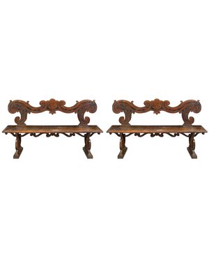 Pair of noble benches in carved solid walnut. Northern Italy, 17th century.